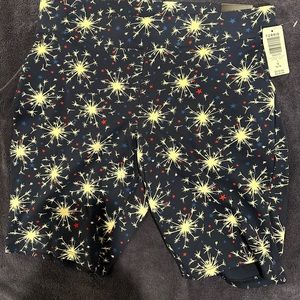 Torrid size 1 blue bike shorts with fireworks on them